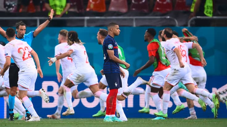 France's forward Kylian Mbappe (C) reacts after missing a penalty during the UEFA EURO 2020 round of 16 football match between France and Switzerland at the National Arena in Bucharest on June 28, 2021. (Photo by FRANCK FIFE / POOL / AFP)