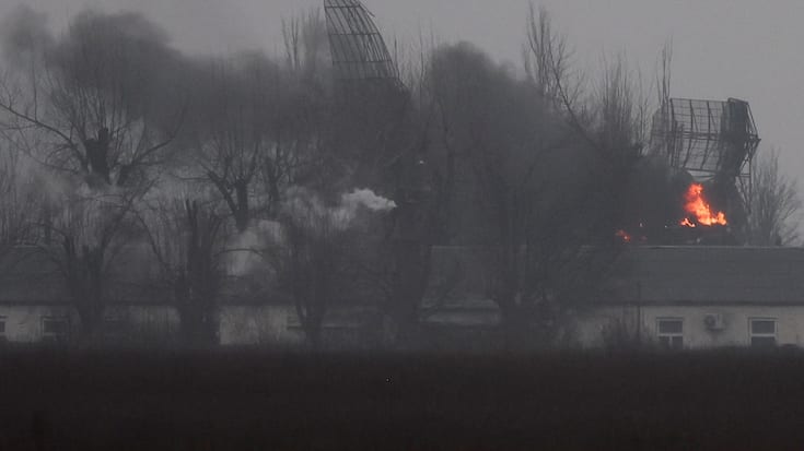 Fire is seen coming out of a military installation near the airport, after Russian President Vladimir Putin authorized a military operation in eastern Ukraine, in Mariupol, February 24, 2022. REUTERS/Carlos Barria