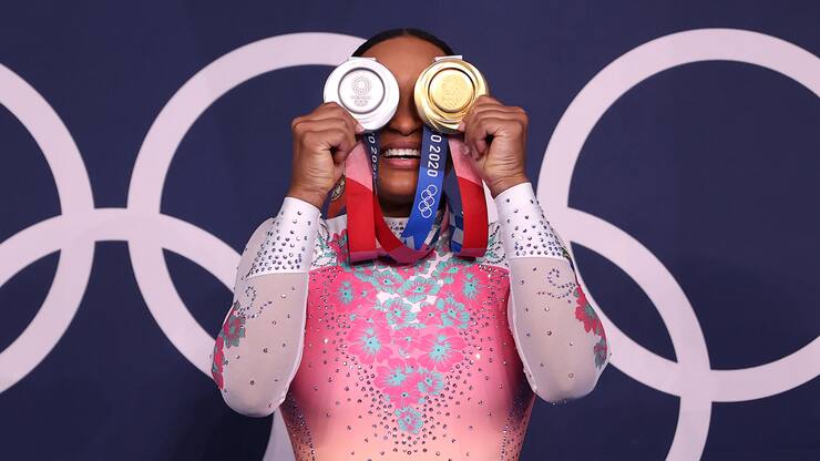 TOKYO, JAPAN - AUGUST 02: Rebeca Andrade of Team Brazil poses with her women's all-around silver and vault gold medals during the Women's Floor Exercise Final on day ten of the Tokyo 2020 Olympic Games at Ariake Gymnastics Centre on August 02, 2021 in Tokyo, Japan. (Photo by Laurence Griffiths/Getty Images)