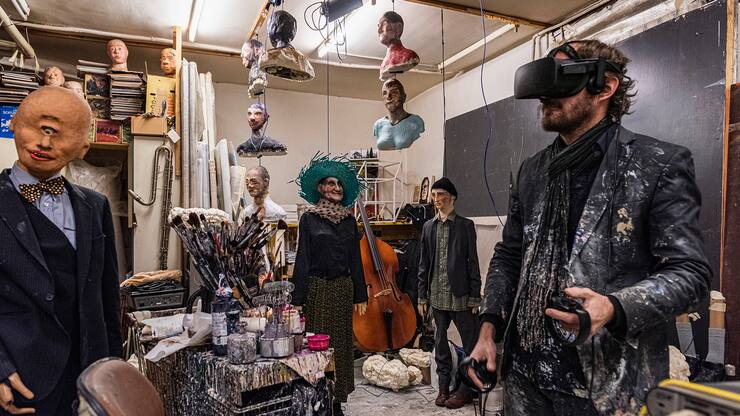 Artist Jonathan Delachaux in his studio in Geneva, in a 3D world he is creating, called Tchan-ZÃ¢ca. Previous and future figures decorate the space. Covid has caused cancellations, but he continues to work on his future projects. Photography by Mark Henley/Flux Laboratory from series 'Culture Phantom'.