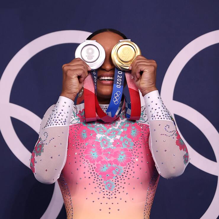 TOKYO, JAPAN - AUGUST 02: Rebeca Andrade of Team Brazil poses with her women's all-around silver and vault gold medals during the Women's Floor Exercise Final on day ten of the Tokyo 2020 Olympic Games at Ariake Gymnastics Centre on August 02, 2021 in Tokyo, Japan. (Photo by Laurence Griffiths/Getty Images)