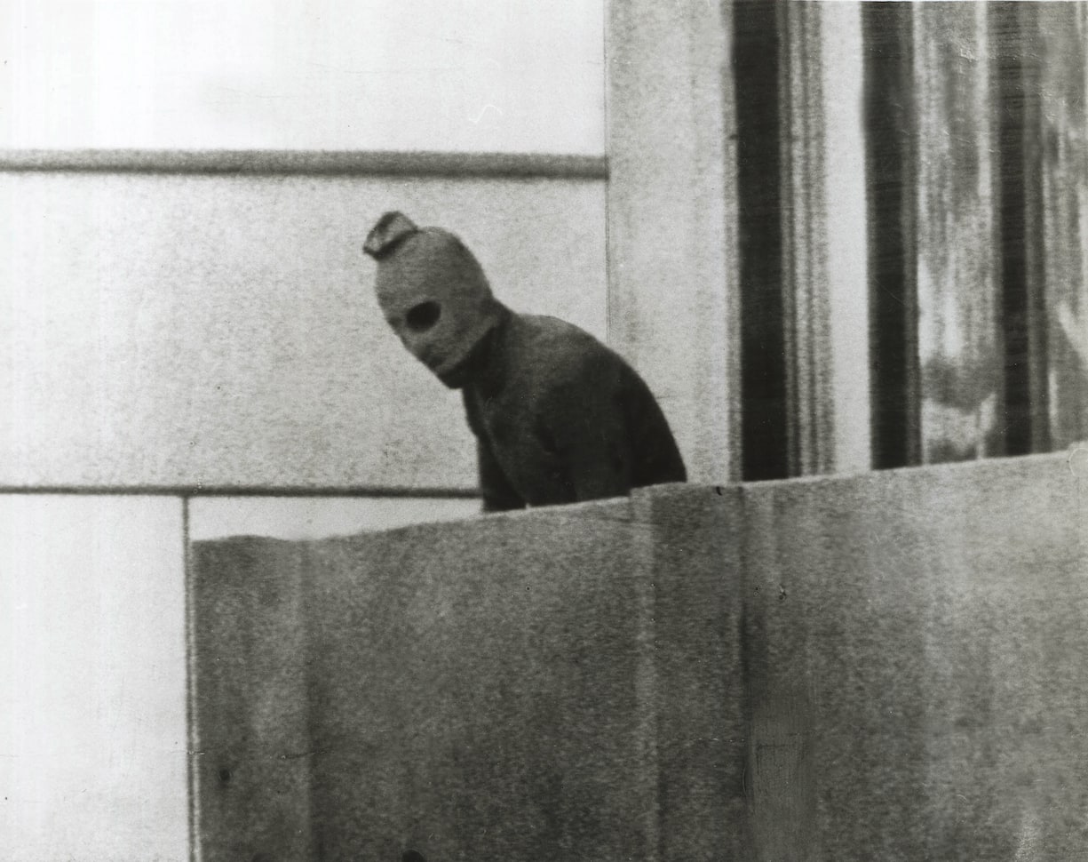 A Fairfax photographer captured one of the defining images of the Munich Olympics in 1972. This Palestinian is one of a group that had taken 12 Israeli athletes hostage. (Photo by Russell Mcphedran/The Sydney Morning Herald/Fairfax Media via Getty Images via Getty Images)