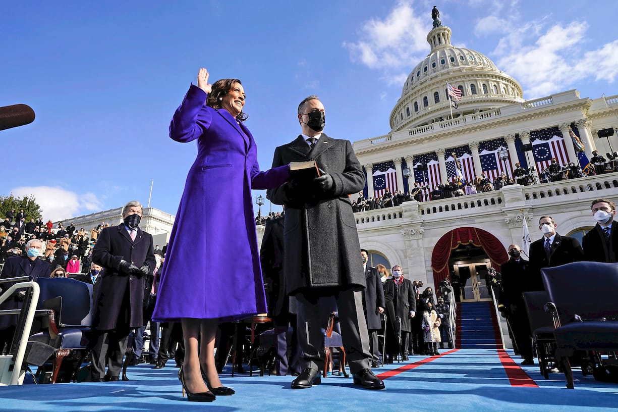 WASHINGTON, DC - JANUARY 20: Kamala Harris is sworn in as Vice President by Supreme Court Justice Sonia Sotomayor as her husband Doug Emhoff holds the Bible during the 59th Presidential Inauguration on the West Front of the U.S. Capitol on January 20, 2021 in Washington, DC. During today's inauguration ceremony Joe Biden becomes the 46th president of the United States. (Photo by Andrew Harnik - Pool/Getty Images)