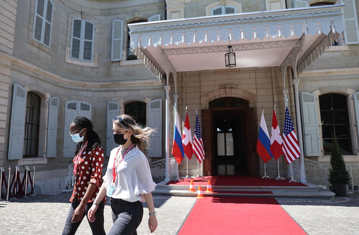 GENEVA, SWITZERLAND JUNE 15, 2021: Girls at the entrance to the Villa La Grange, a venue for a summit between Russia's President Vladimir Putin and US President Joe Biden scheduled for June 16, 2021. Sergei Bobylev/TASS/Sipa USA