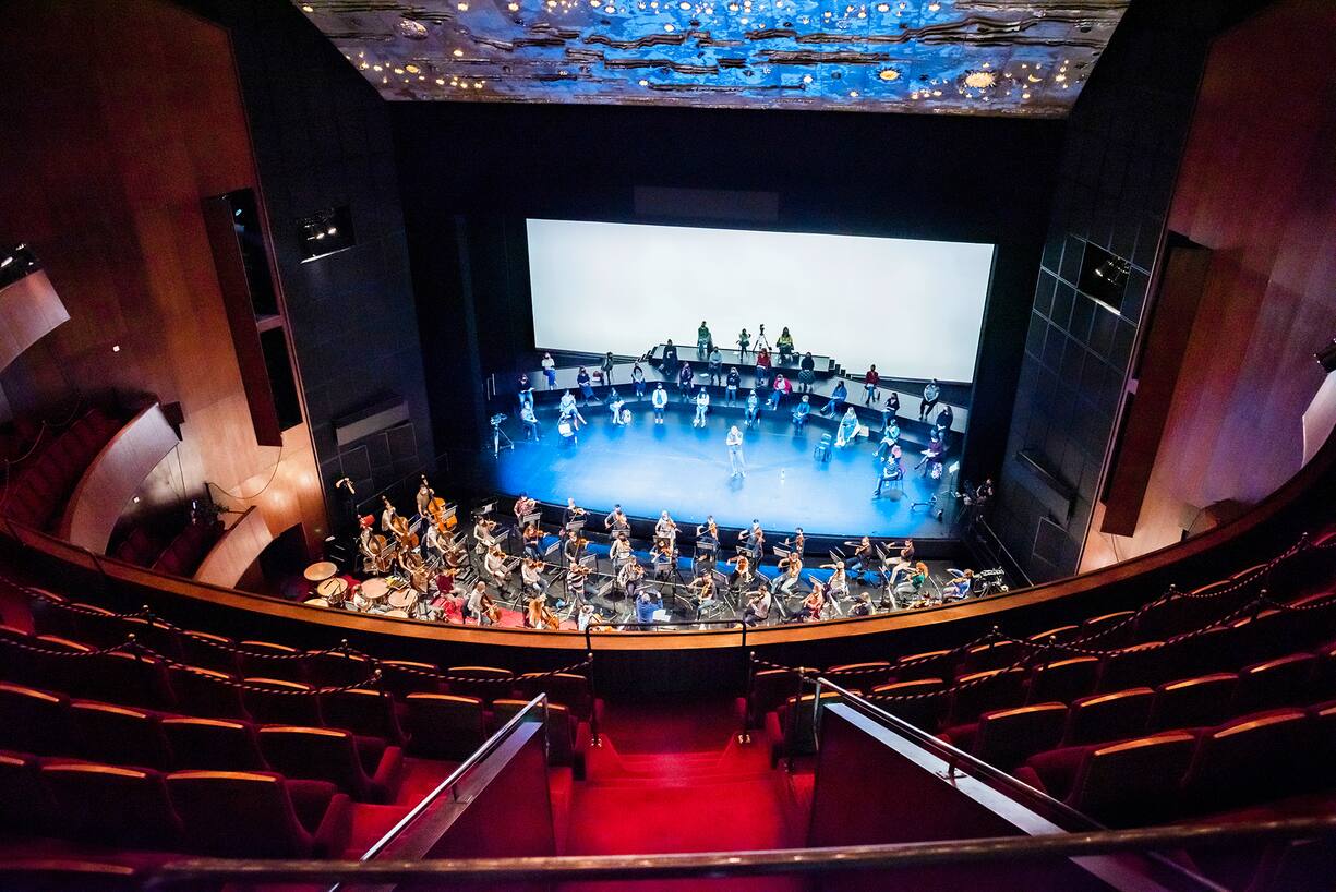 Jonathan Knott directing a rehearsal for a special stripped down Covid 'Parsifal' at the Grand Thèâtre de Genève. It was planned to be live-streamed on Easter Friday, but had to be cancelled at the last minute due to Covid infection. Photography by Mark Henley/Flux Laboratory from series 'Culture Phantom'.