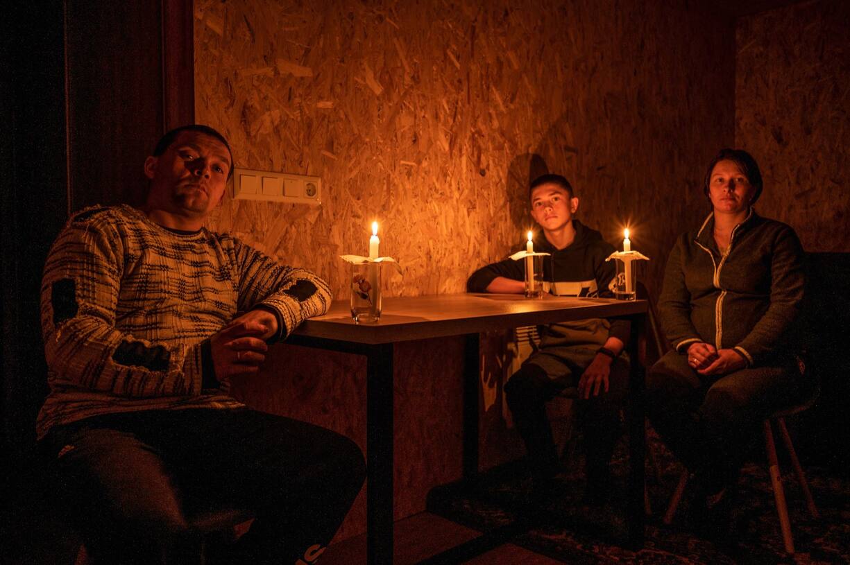 Tetiana Romanenka, 30 ans, Leonid Romanenko, bûcheron, 34 ans, Maksym Romanenko, 14 ans.