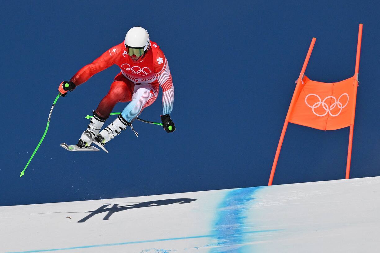 Switzerland's Justin Murisier takes part in the menÃ­s downhill second training session during the Beijing 2022 Winter Olympic Games at the Yanqing National Alpine Skiing Centre in Yanqing on February 4, 2022. (Photo by Joe KLAMAR / AFP)