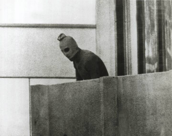 A Fairfax photographer captured one of the defining images of the Munich Olympics in 1972. This Palestinian is one of a group that had taken 12 Israeli athletes hostage. (Photo by Russell Mcphedran/The Sydney Morning Herald/Fairfax Media via Getty Images via Getty Images)