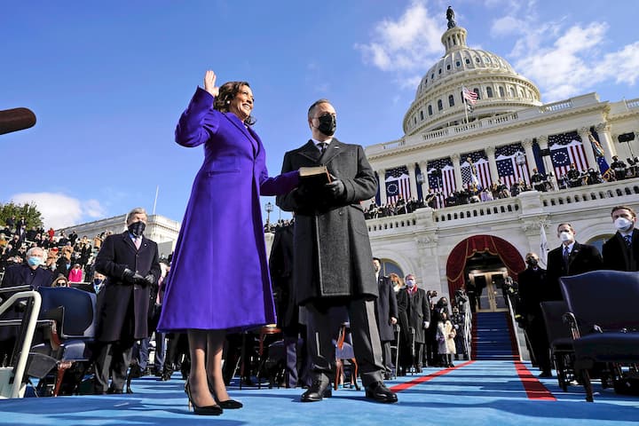 WASHINGTON, DC - JANUARY 20: Kamala Harris is sworn in as Vice President by Supreme Court Justice Sonia Sotomayor as her husband Doug Emhoff holds the Bible during the 59th Presidential Inauguration on the West Front of the U.S. Capitol on January 20, 2021 in Washington, DC. During today's inauguration ceremony Joe Biden becomes the 46th president of the United States. (Photo by Andrew Harnik - Pool/Getty Images)