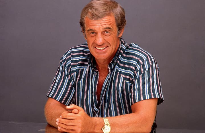 Jean-Paul Belmondo aura 80 ans le 9 avril 2013 Portrait souriant en studio photo de l'acteur franÃ§ais Jean Paul Belmondo Mot cle: bijou, montre (FOTO: DUKAS/BUREAU233) Zusammenstellung: Jean-Paul Belmondo wird am 9. April 2013 80 Jahre alt