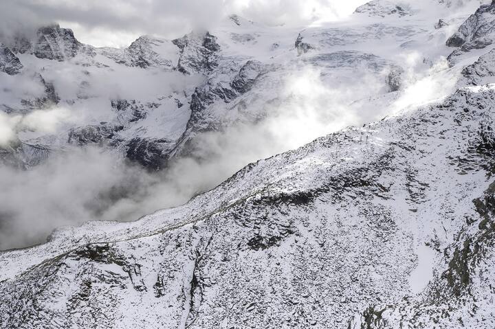 Aerial view of Valnontey and the Glacier Tribolazione. Val di Cogne, Gran Paradiso National Park, Valle d'Aosta, Italy