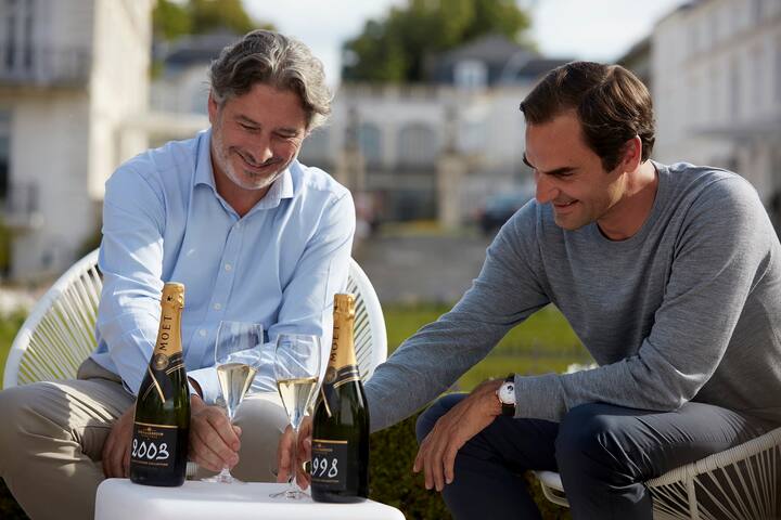 oger Federer with Benoit Gouez in the Orangerie gardens