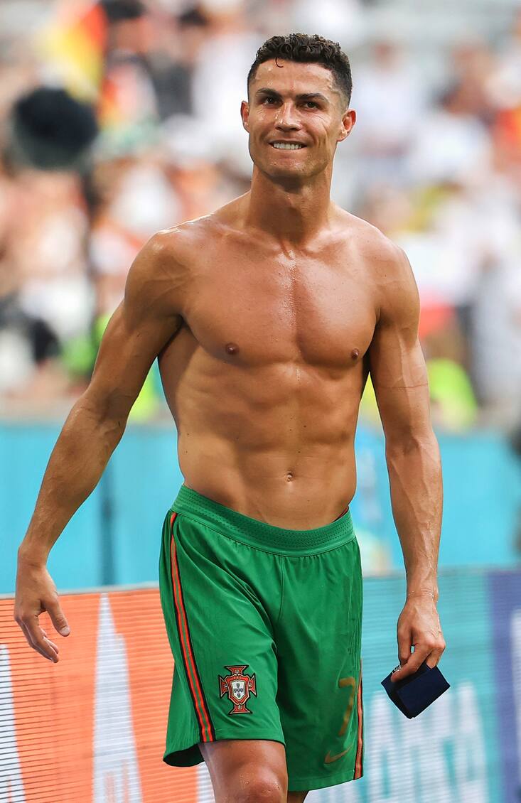 MUNICH, GERMANY - JUNE 19: Cristiano Ronaldo of Portugal looks dejected following defeat in the UEFA Euro 2020 Championship Group F match between Portugal and Germany at Football Arena Munich on June 19, 2021 in Munich, Germany. (Photo by Kai Pfaffenbach - Pool/Getty Images)